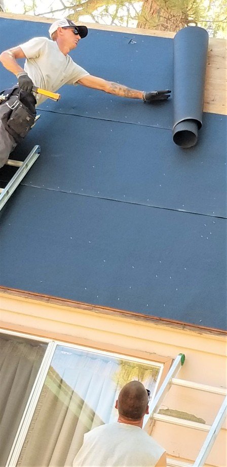 Photo of roofing team, replacing roof. Roof Replacement - Brajar Roofing Company - Hickory, North Carolina